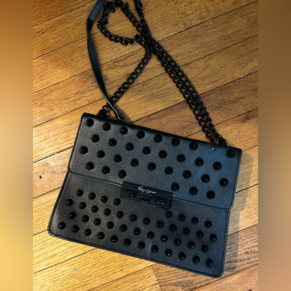Black spiked handbag